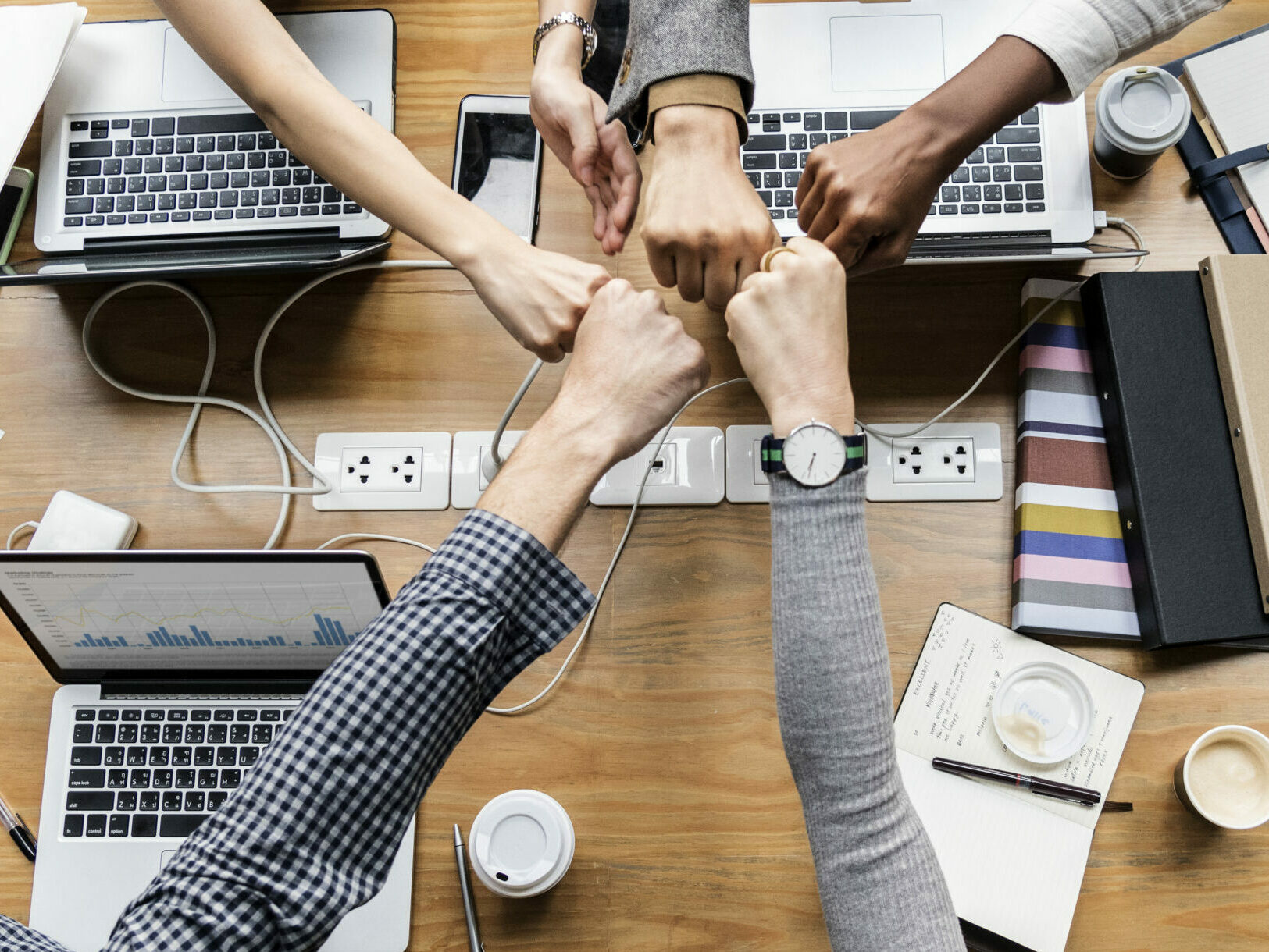 Colleagues giving a fist bump